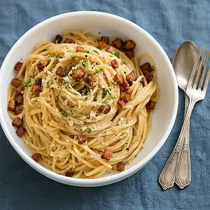 Vegan spaghetti carbonara 5 Vegan spaghetti carbonara met room en tofu spek